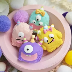 Whimsical monster artisan resin keycap featuring a vibrant, handcrafted little monster encased in colorful translucent resin for a unique ESC key.