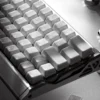 Detailed view of unique ice crack ceramic keycap texture, highlighting the intricate natural patterns and translucent finish.