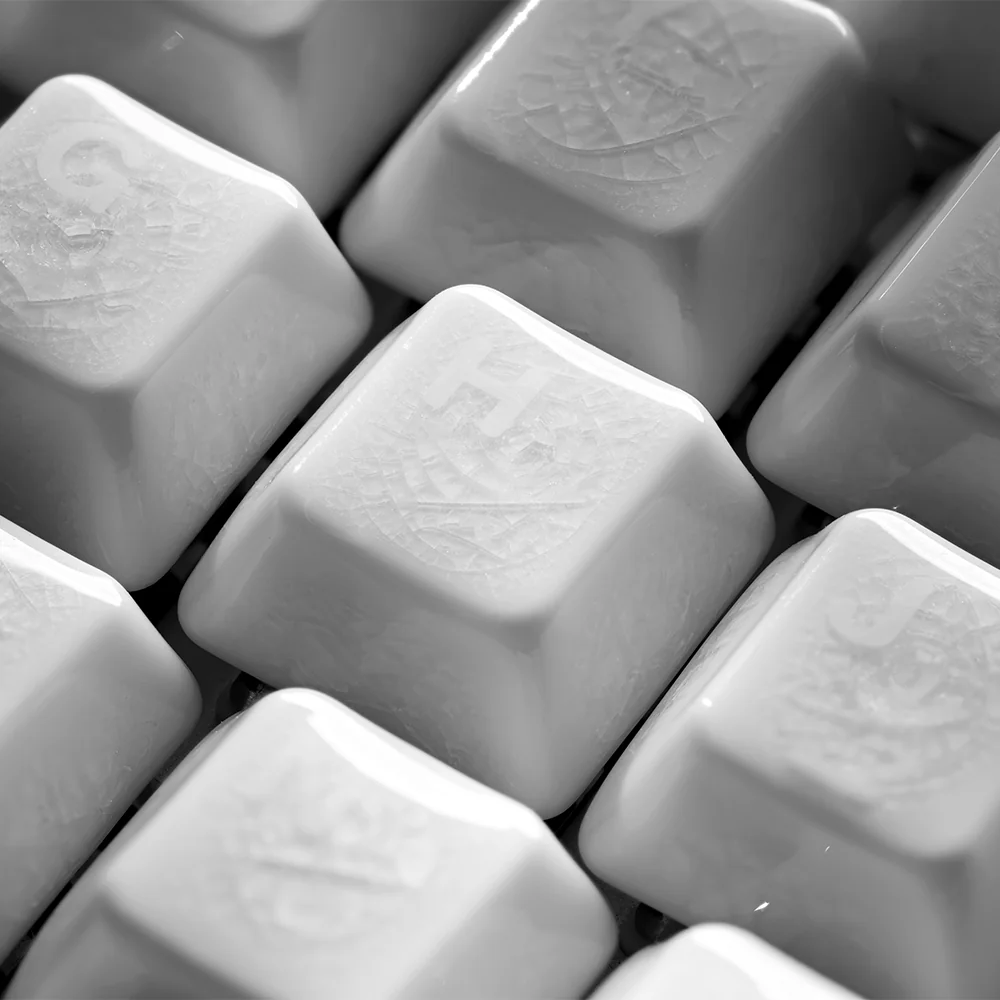 Various angles of premium ceramic ice crack keycaps, revealing their elegant translucent design and tactile appeal for keyboard customization.