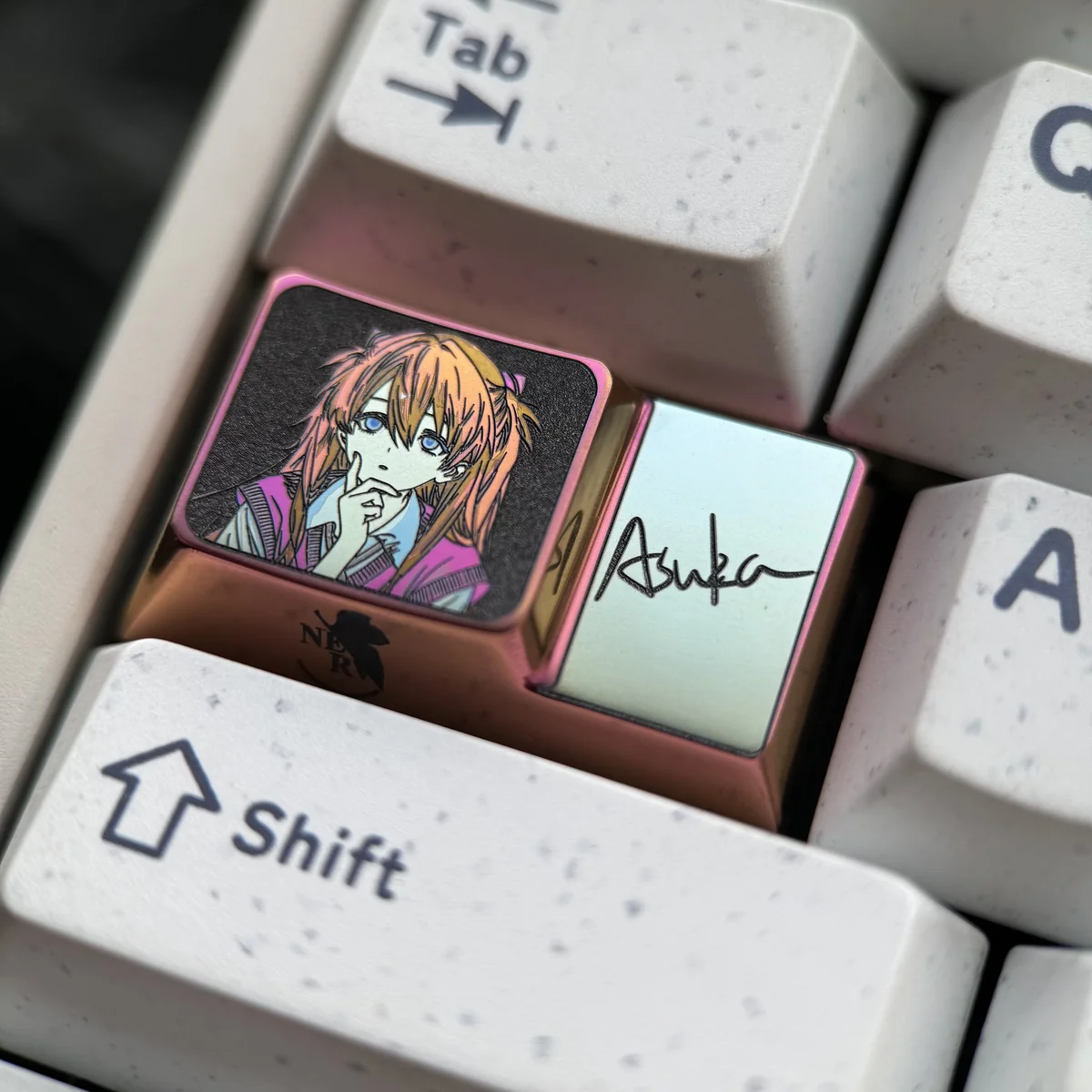 Detailed view of Asuka Langley Soryu titanium keyboard key, highlighting premium finish and character design.