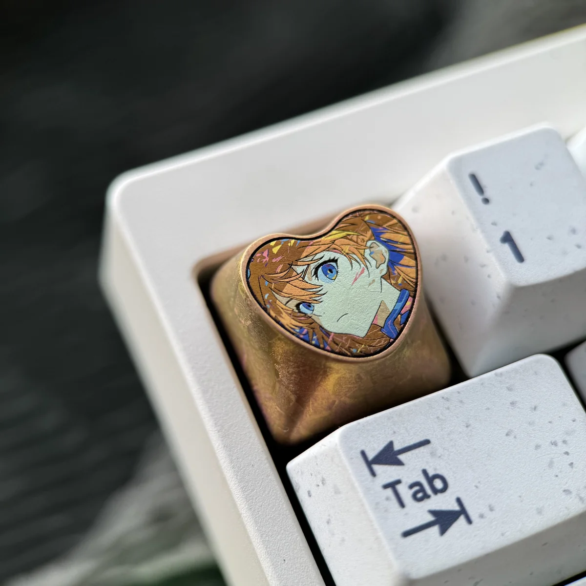 Gallery view of the Asuka Evangelion custom ESC key, highlighting its vibrant red and orange hues.