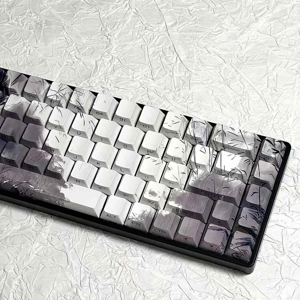 Artistic Bamboo Rain PBT keycaps set from multiple angles, showcasing the unique side-lit design with serene bamboo, falling rain, and a character.