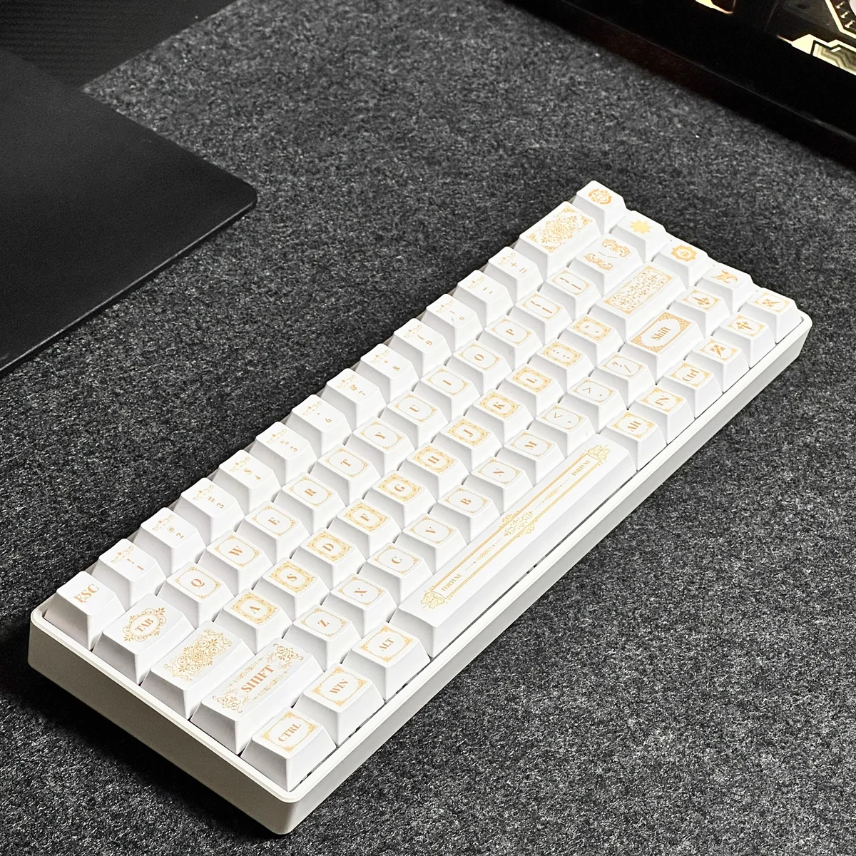Detailed views of the Baroque PBT Dye-Sub Keycap Set, showcasing intricate platinum and neutral patterns. Highlighting exquisite artistry and PBT durability.
