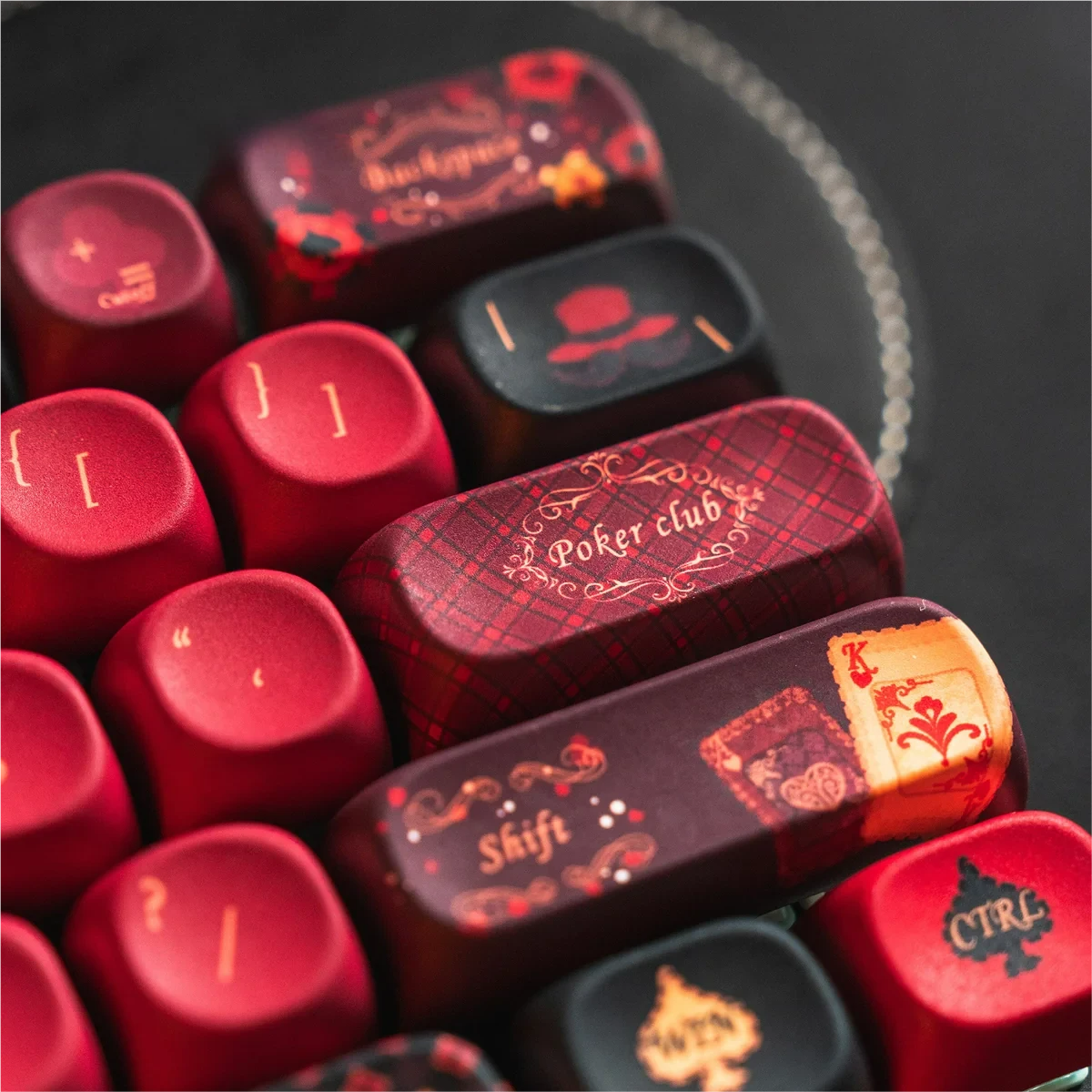 Black Spade Queen MOA PBT keycap set. Detailed views showcase its unique MOA profile, durable PBT, and elegant monochromatic royal spade design.