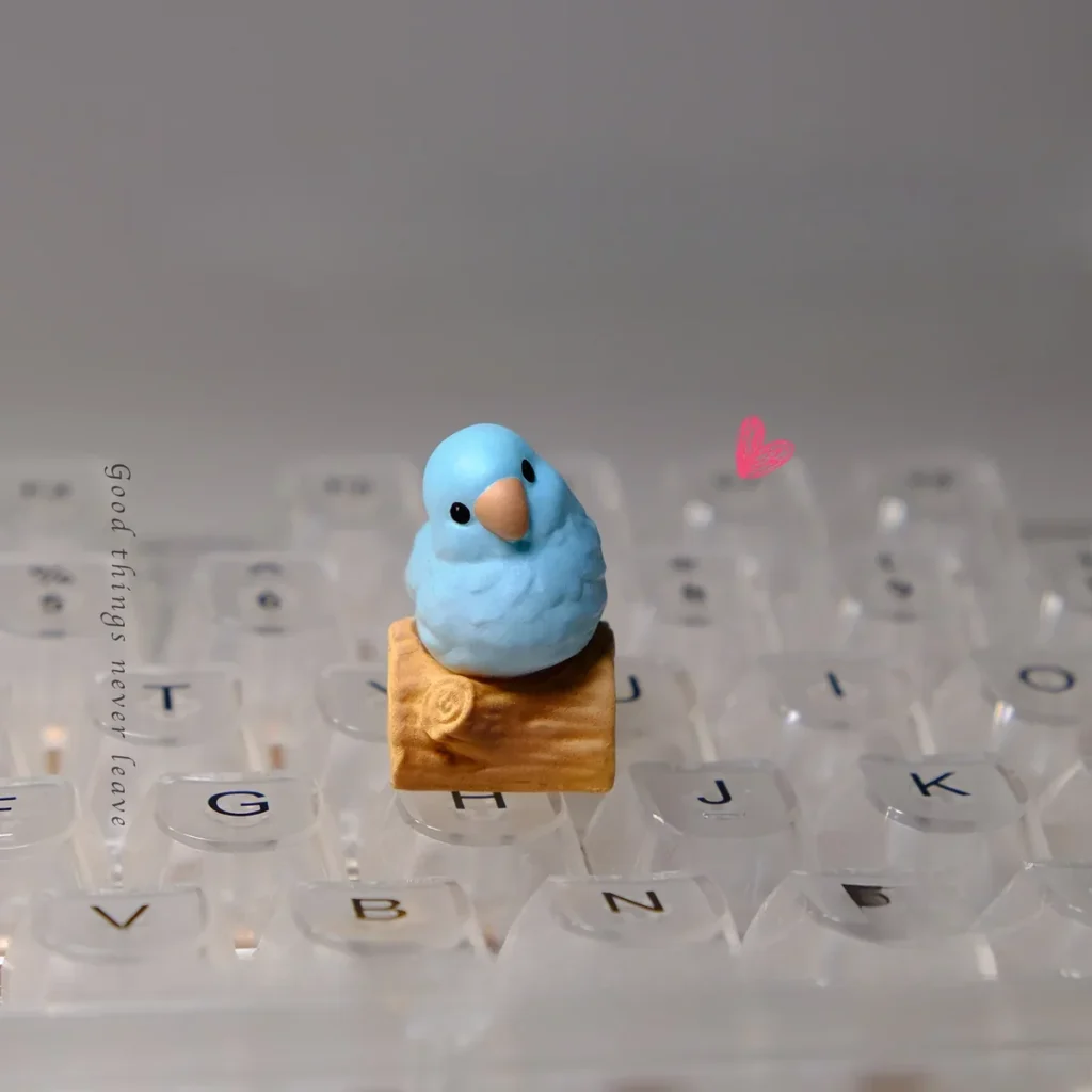 Exquisite handcrafted resin Blue Parrot Keycap, a vibrant sculptural art piece for MX boards, showcasing intricate detail.