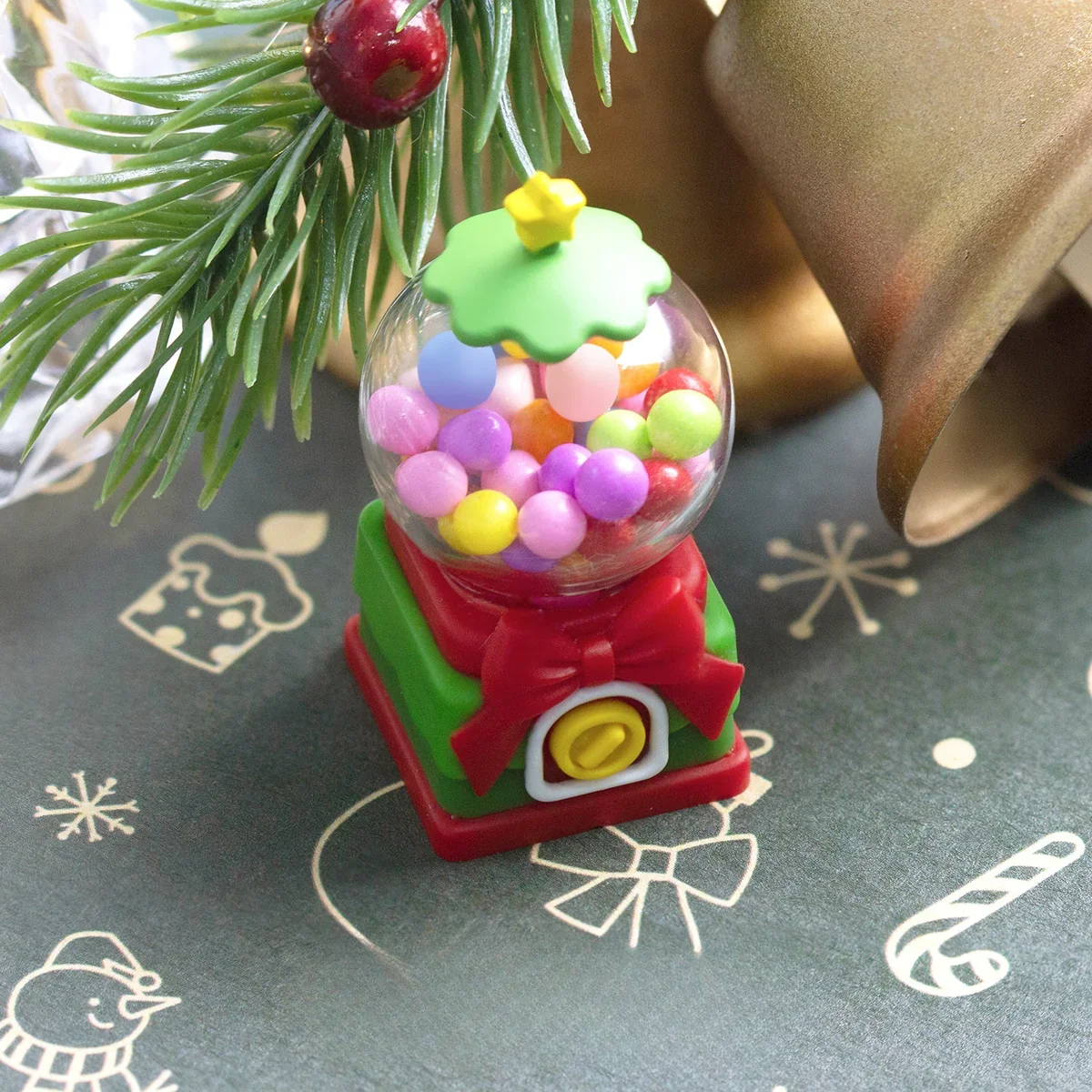 Close-up side view of the nostalgic handcrafted resin candy machine keycap, showcasing its intricate retro details and vibrant colors.