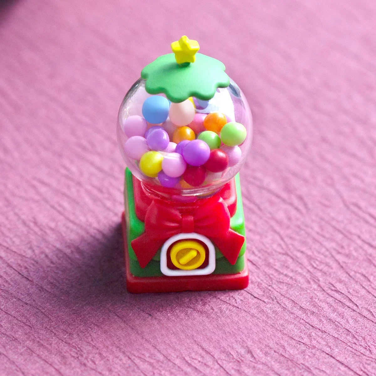 Handcrafted nostalgic candy machine keycap, a vibrant resin art piece, shown from various artistic angles with intricate retro details.