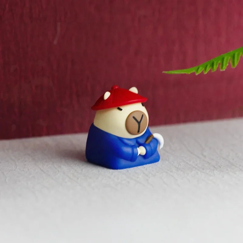 Artisan handcrafted resin capybara Servant keycap, showcasing its charming 3D sculpted design and whimsical details from multiple perspectives.