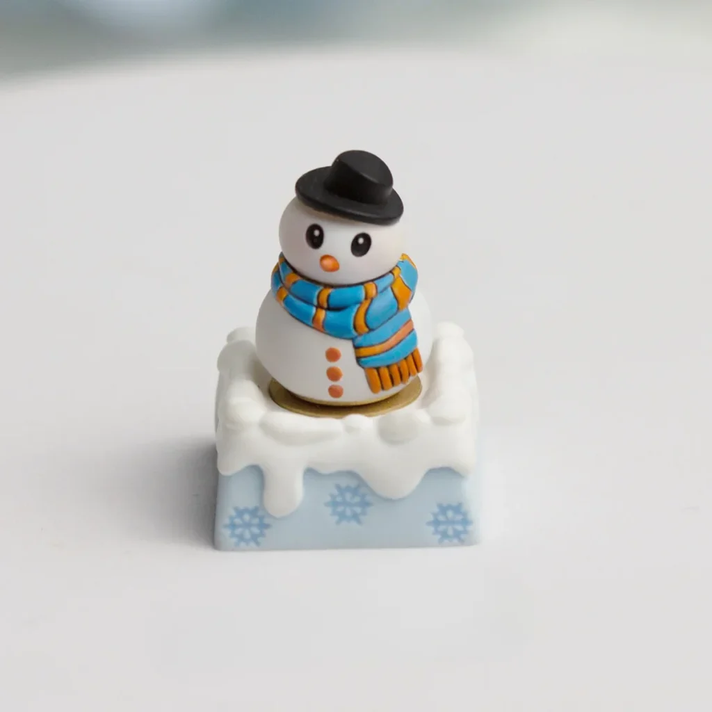 A collection of detailed views of the handcrafted blue resin Christmas artisan ESC keycap, revealing its intricate festive winter wonderland design.
