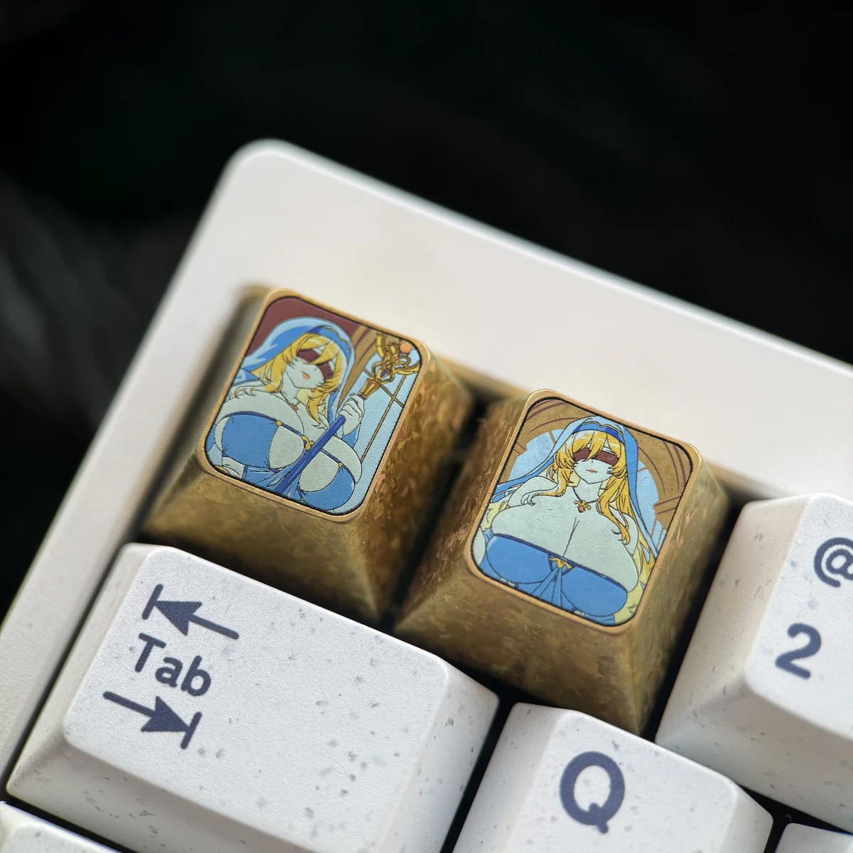 Side profile of the premium titanium Sword Maiden keycap, revealing its intricate design.