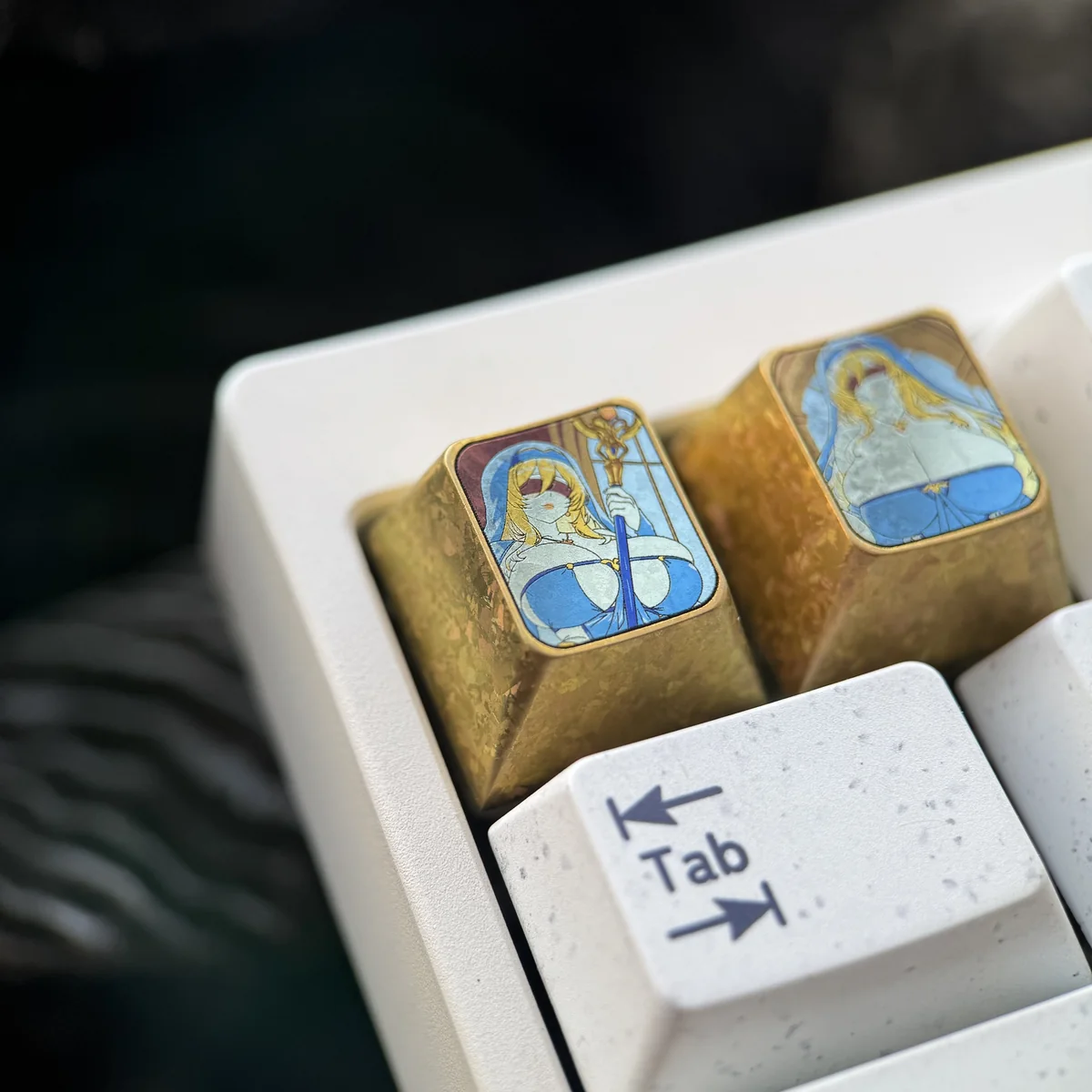 Multiple angles of the collectible Goblin Slayer keycap, an essential for anime fans.
