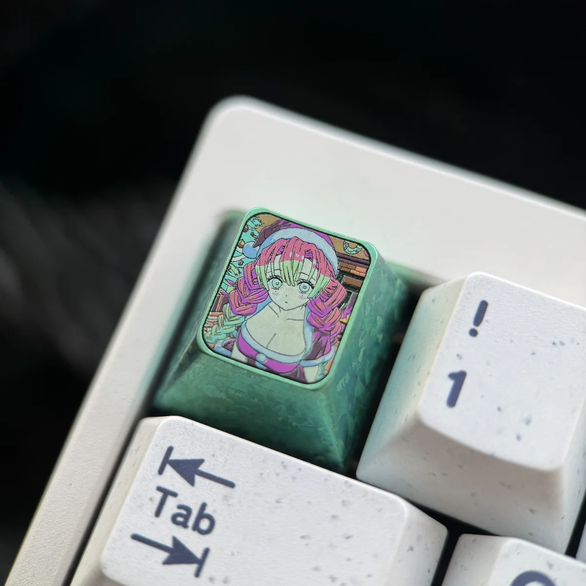 Premium titanium Mitsuri Kanroji Demon Slayer keycap, showcasing vibrant pink and green metallic finish and intricate details from various angles.