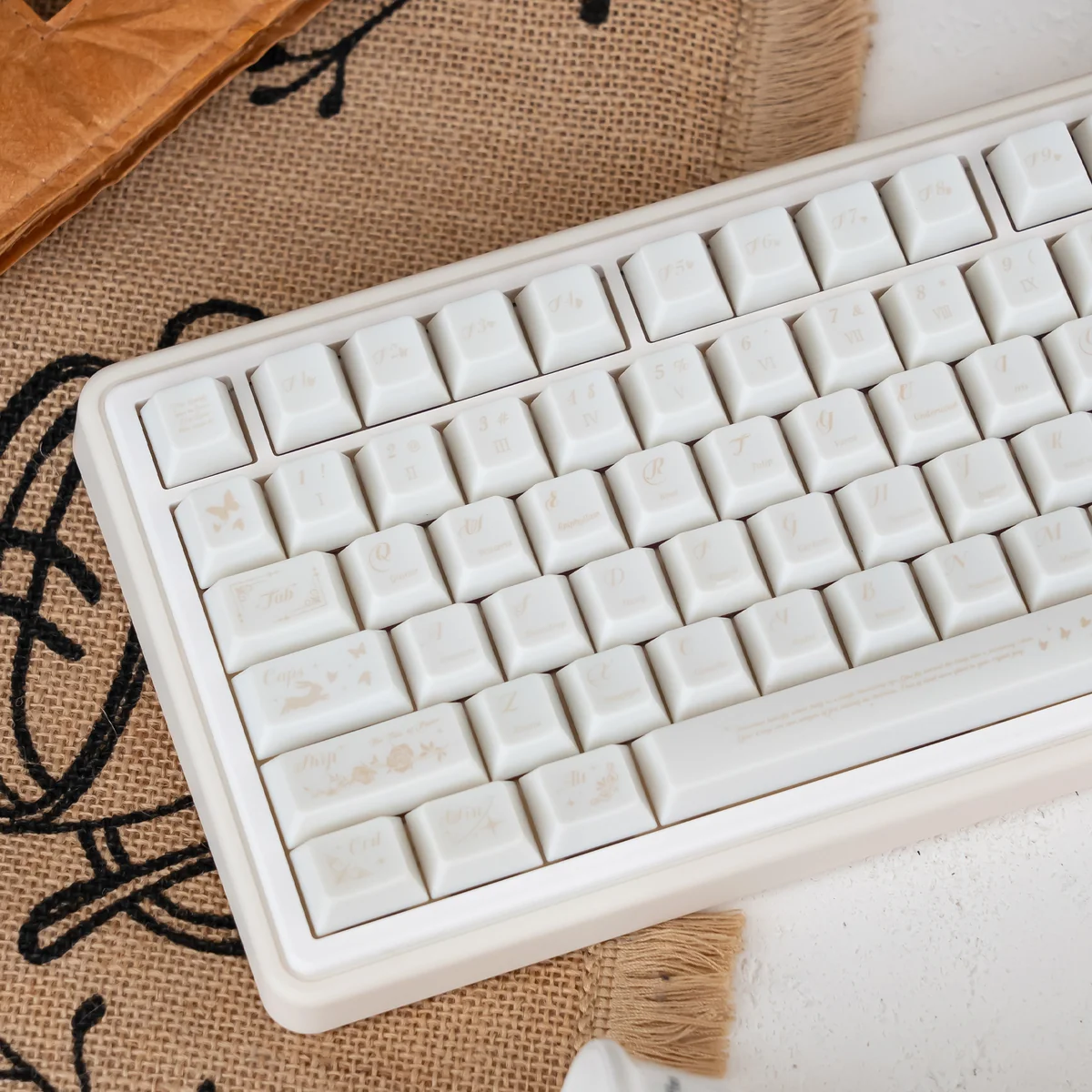 Ethereal Dream Butterfly PC Cherry Keycaps, showcasing milky white butterfly motifs from multiple angles. Emphasizes serene design and durable PC material.