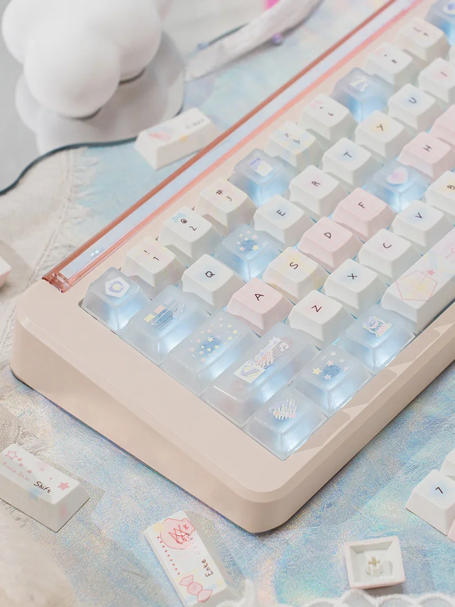 Macro shot of custom keyboard caps, highlighting the dreamy translucent PBT PC blend and vibrant pastel gradient hues.