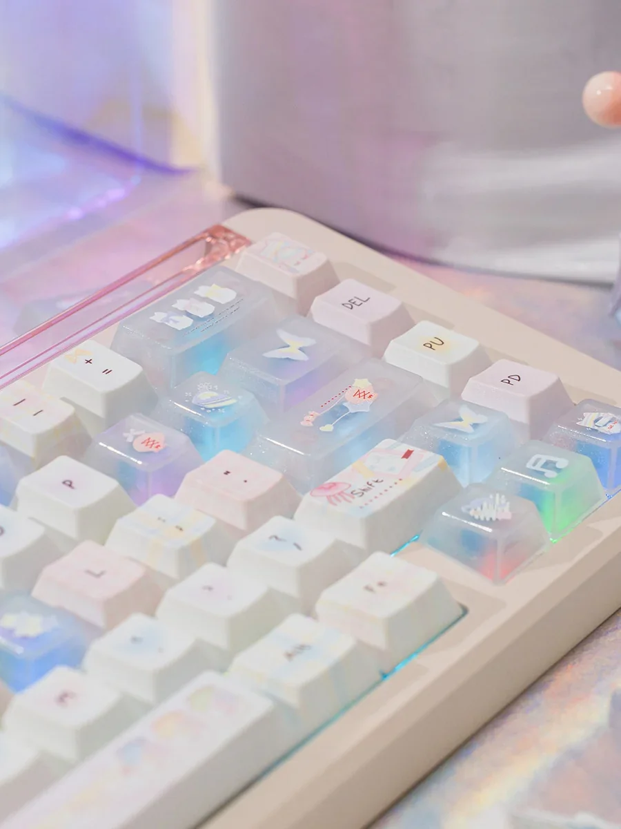 Close-up of aesthetic keyboard keycaps, demonstrating the PBT PC blend's translucent quality and serene pastel gradients.