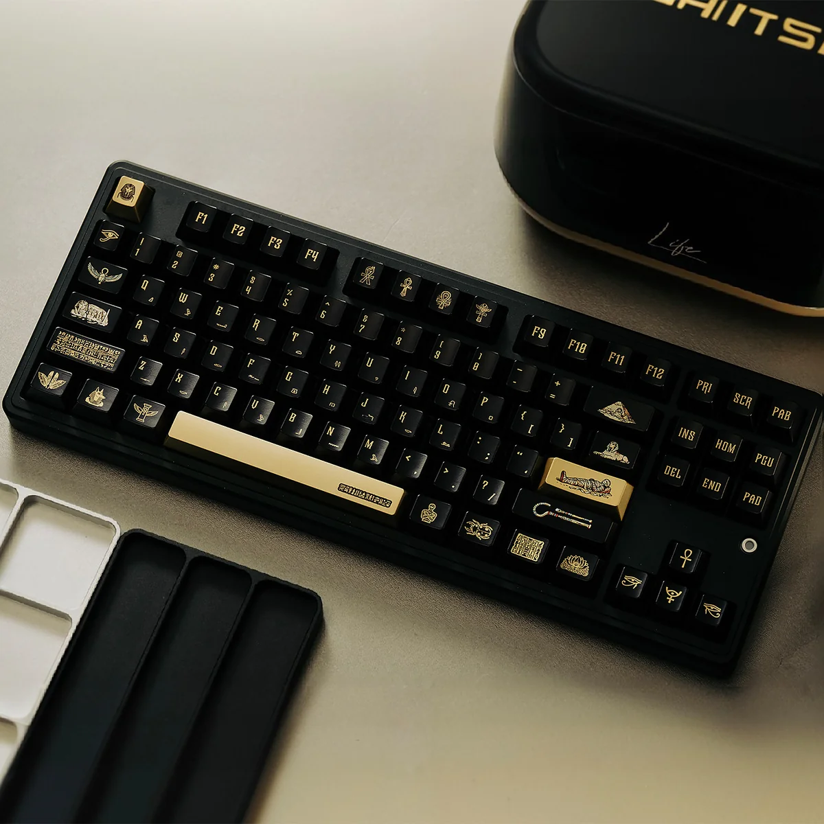 Detailed view of the exquisite Egypt Black & Gold PBT Keycap Set, showcasing intricate hieroglyphs and the luxurious metallic finish.