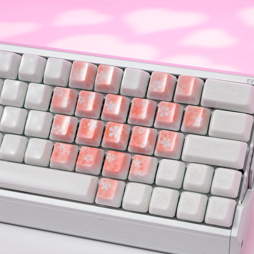 Premium custom keycaps with translucent ceramic, cherry blossoms, butterflies, and heart designs.