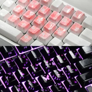 Custom ceramic keyboard keycaps featuring translucent hearts, cherry blossoms, and butterflies.
