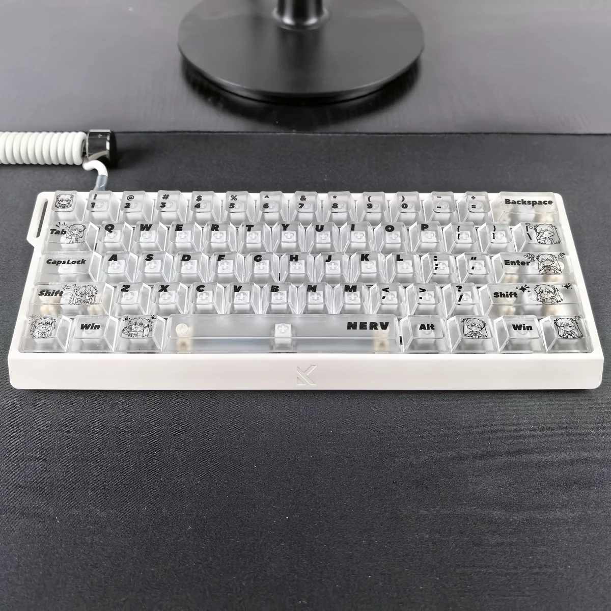 EVA Asuka translucent PC keycaps set showcasing futuristic anime aesthetic with ethereal glow and vibrant character accents from various angles.