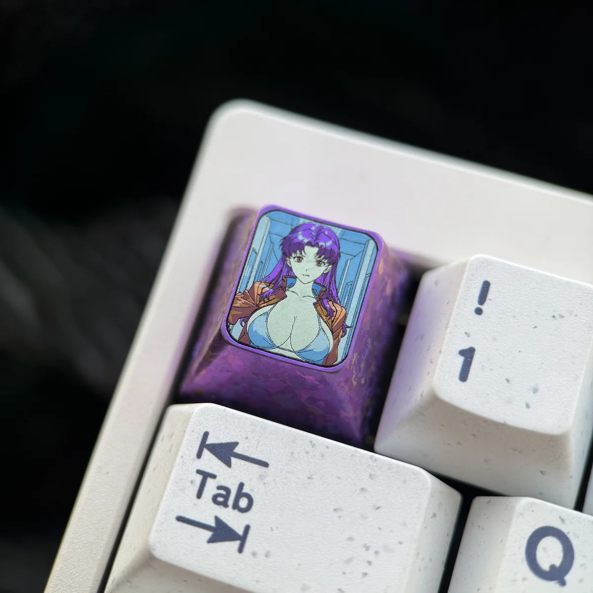 Detailed view of the Misato Katsuragi anime keyboard cap, highlighting titanium texture and precise character artwork from multiple angles.