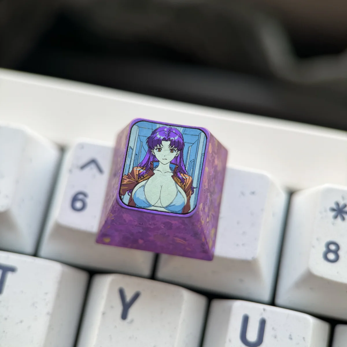 Close-up of the durable Misato Katsuragi custom keycap for mechanical keyboards, featuring vivid Evangelion character art.