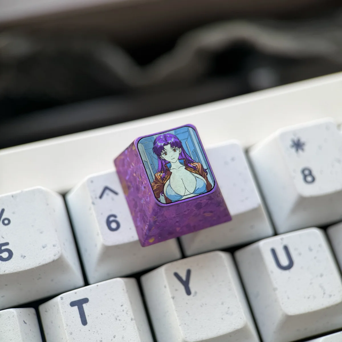 Misato Katsuragi collectible keyboard accessory, a high-quality titanium keycap for Evangelion fans, displayed from various views.
