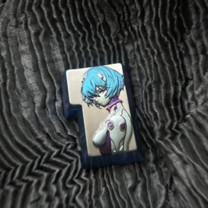 Evangelion Rei Ayanami titanium 3D custom enter key for mechanical keyboards, highlighting the detailed anime character sculpture and metallic sheen.