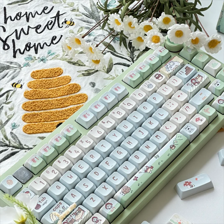 Artistic view of Spring Forest Whimsy PBT keycaps set, highlighting durable PBT and whimsical nature-inspired flora from various angles.