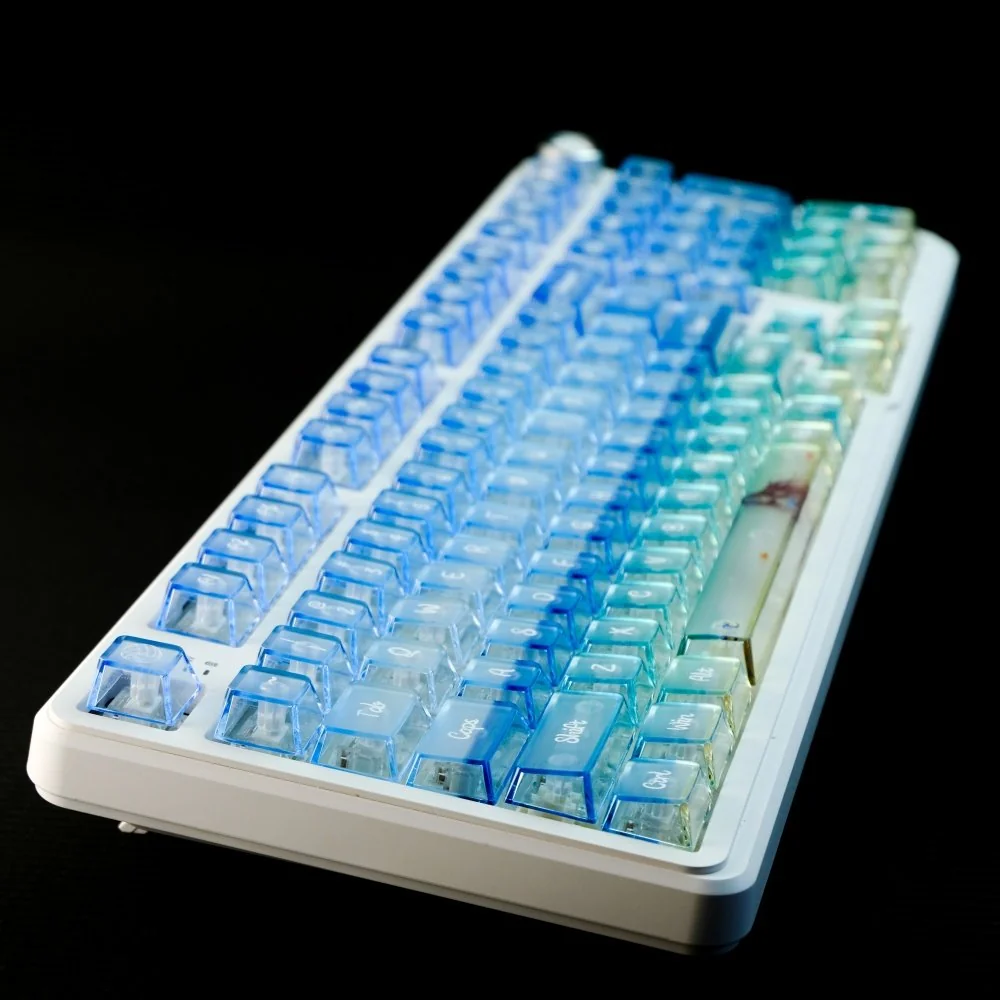 Sea Salt Frosted PC Gradient Keycaps Set. Multiple angles reveal the translucent frosted blue-white gradient, highlighting an ethereal ocean summer aestthetics.