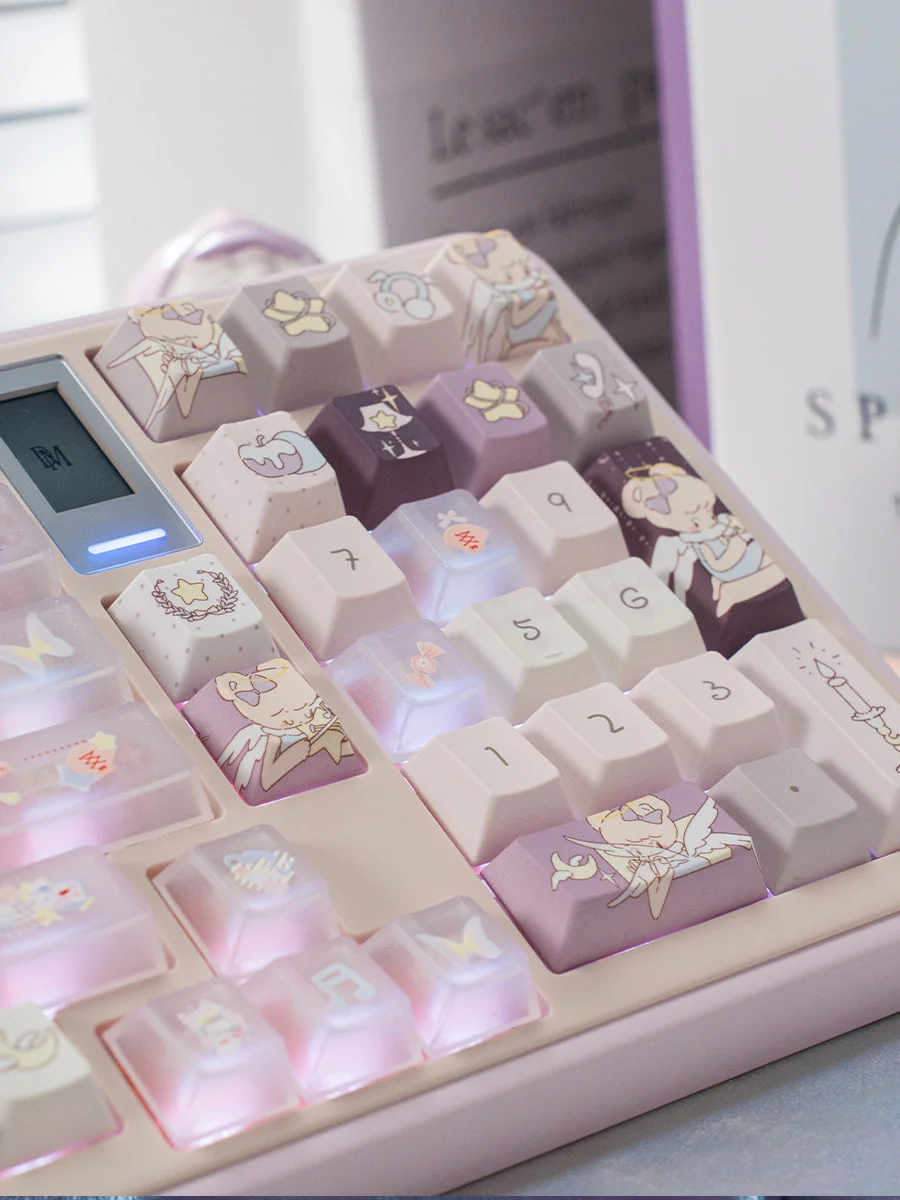 Artistic display of unique purple glitter keyboard caps, featuring a translucent celestial design for custom keyboards.