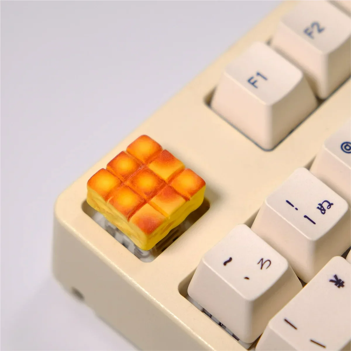 Handcrafted Whimsical Grid Cake Artisan Keycap in 3D, showcasing its vibrant miniature dessert design from multiple angles.