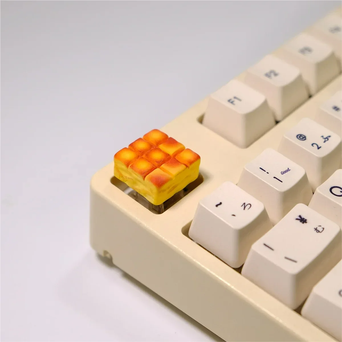 Whimsical handcrafted 3D grid cake artisan keycap shown from multiple playful angles, highlighting its vibrant miniature dessert details.