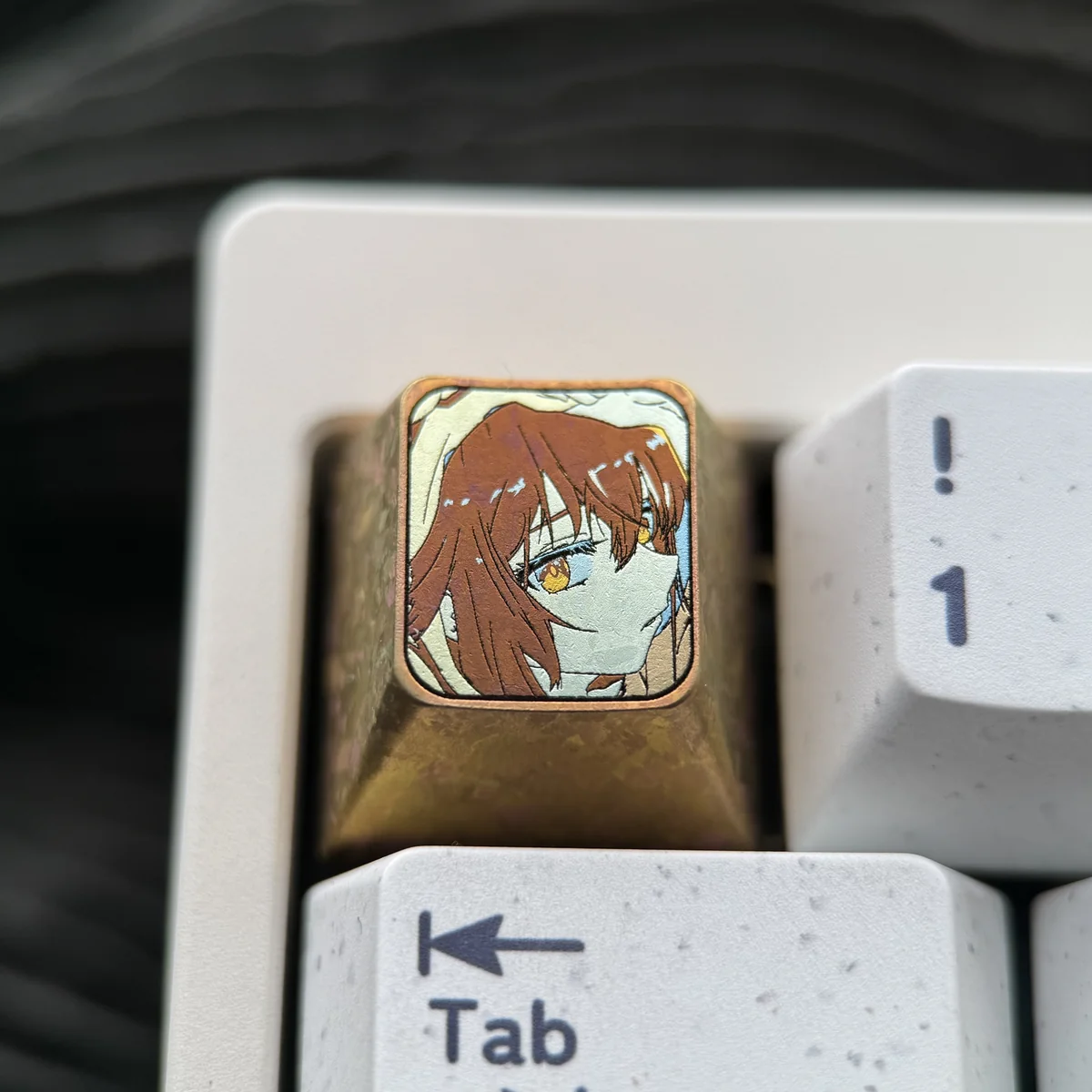 Gallery of the Haibara Ai custom keyboard cap, featuring its exquisite design and polished titanium construction from various premium viewpoints.