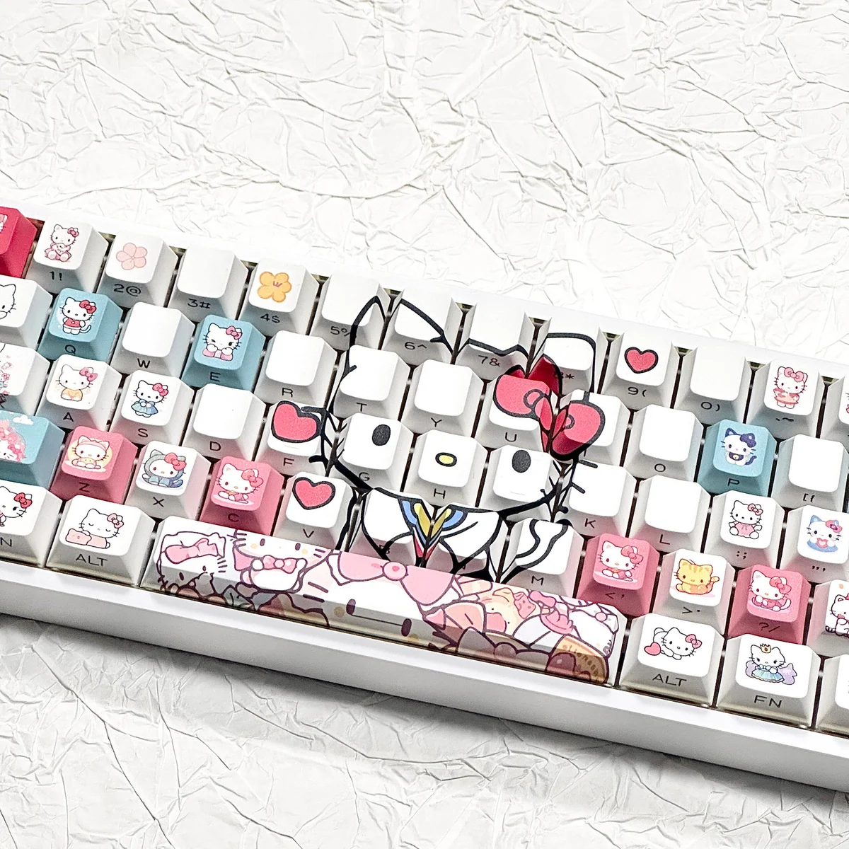 A collection of Hello Kitty PBT side-lit keycaps set from multiple angles, highlighting the durable legends and iconic design ready for vibrant RGB keyboard.