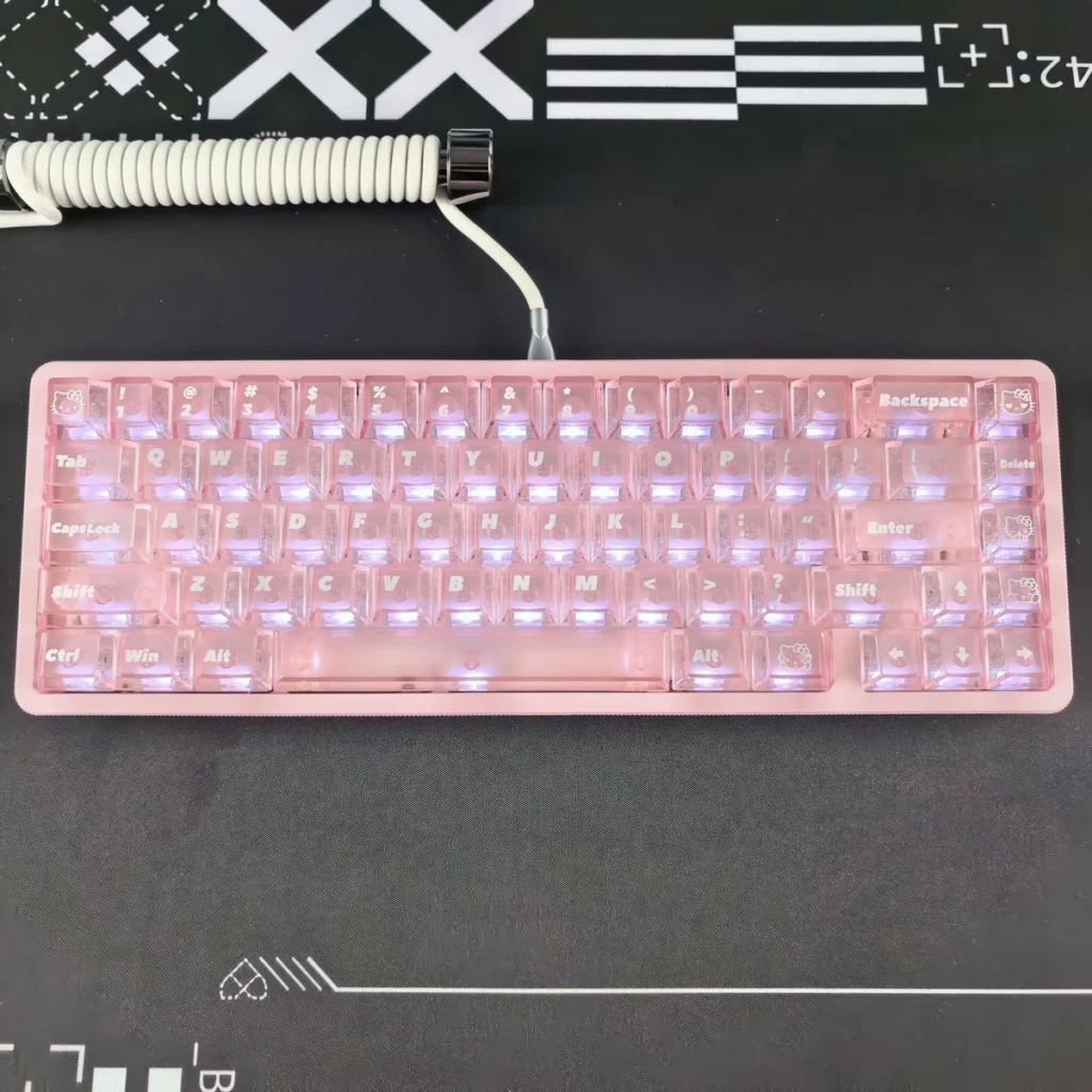 Iconic Hello Kitty frosted pink keycap set, showcasing its playful design and soft, translucent backlit glow.