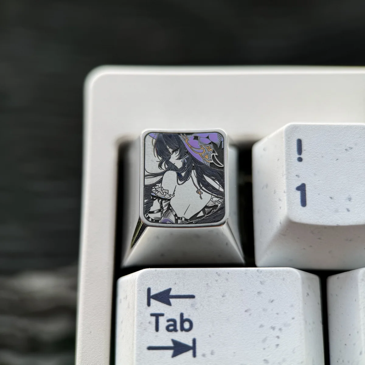 Close-up of the Honkai Star Rail Herta custom keycap, showcasing intricate character details and premium titanium finish.