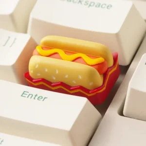 A charming handcrafted hotdog artisan keycap made of detailed resin, showcasing whimsical miniature food art, perfectly fits an ESC key.