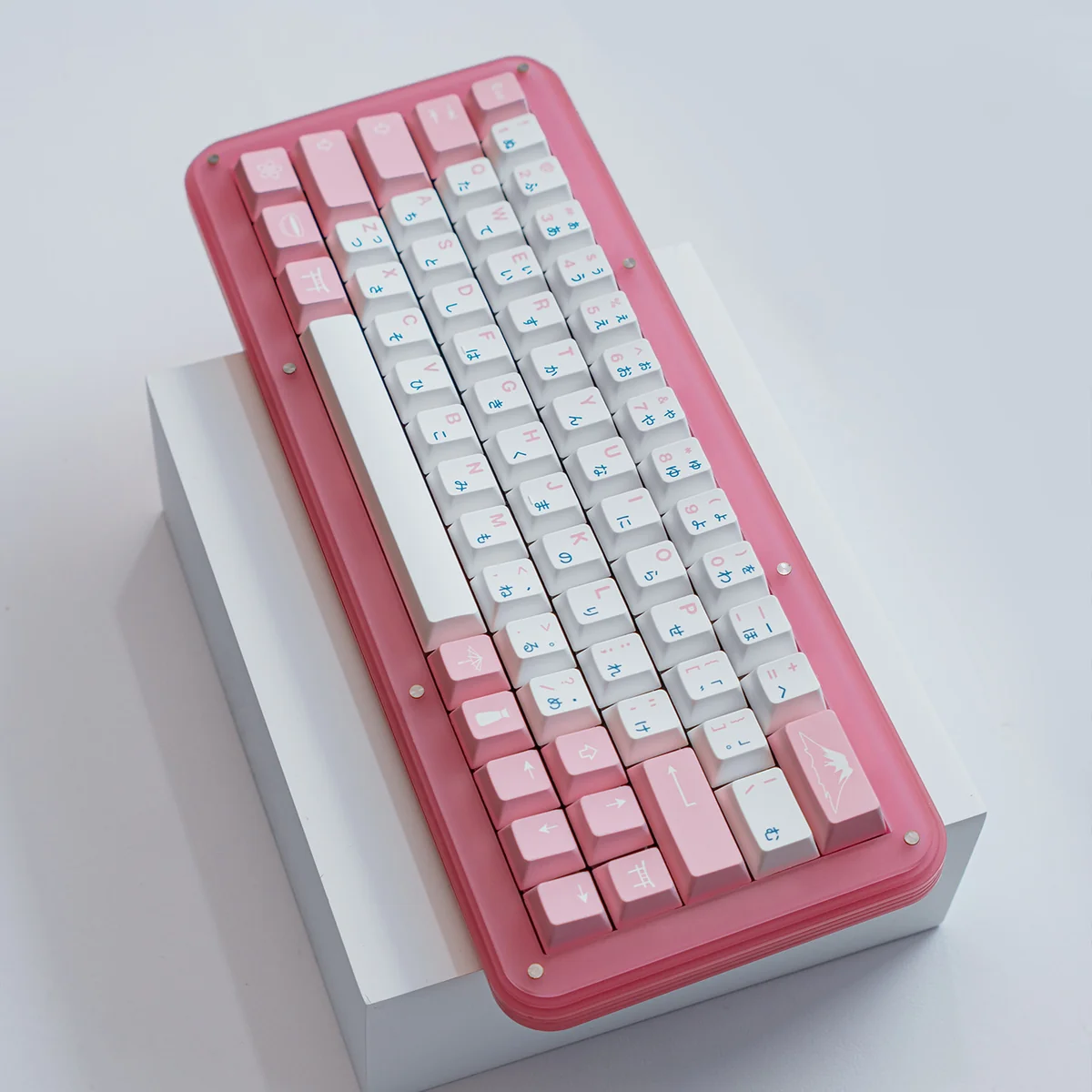 Sakura PBT dye-sub keycaps set from various angles, featuring delicate pink and white Japanese cherry blossoms. Durable and elegant keyboard aesthetic.