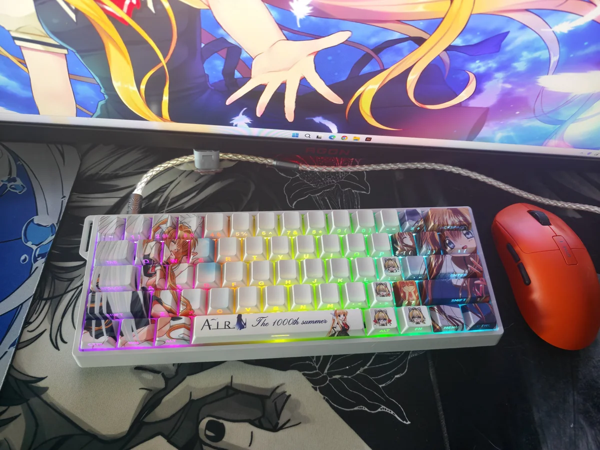 Kamio Misuzu AIR side-print backlit PBT keycaps set, showcasing various angles of their serene skies and gentle wing art, with clear, illuminated legends.