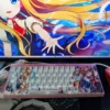 A gallery view of Kamio Misuzu AIR side-print backlit PBT keycaps set, displaying their delicate design and serene, winged motifs from various angles.