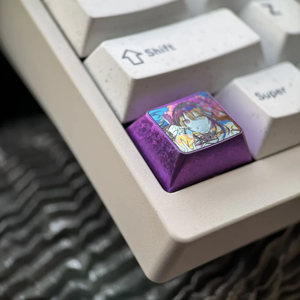 Multiple views of the premium Kurumi Tokisaki titanium keycap, showcasing vibrant Date A Live anime art and its durable metallic finish from various angles.