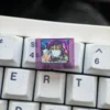 Multiple angles of the Kurumi Tokisaki titanium keycap, showcasing vibrant anime art and the premium metallic finish. A durable Date A Live collections.