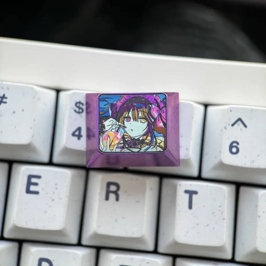 Multiple angles of the Kurumi Tokisaki titanium keycap, showcasing vibrant anime art and the premium metallic finish. A durable Date A Live collections.