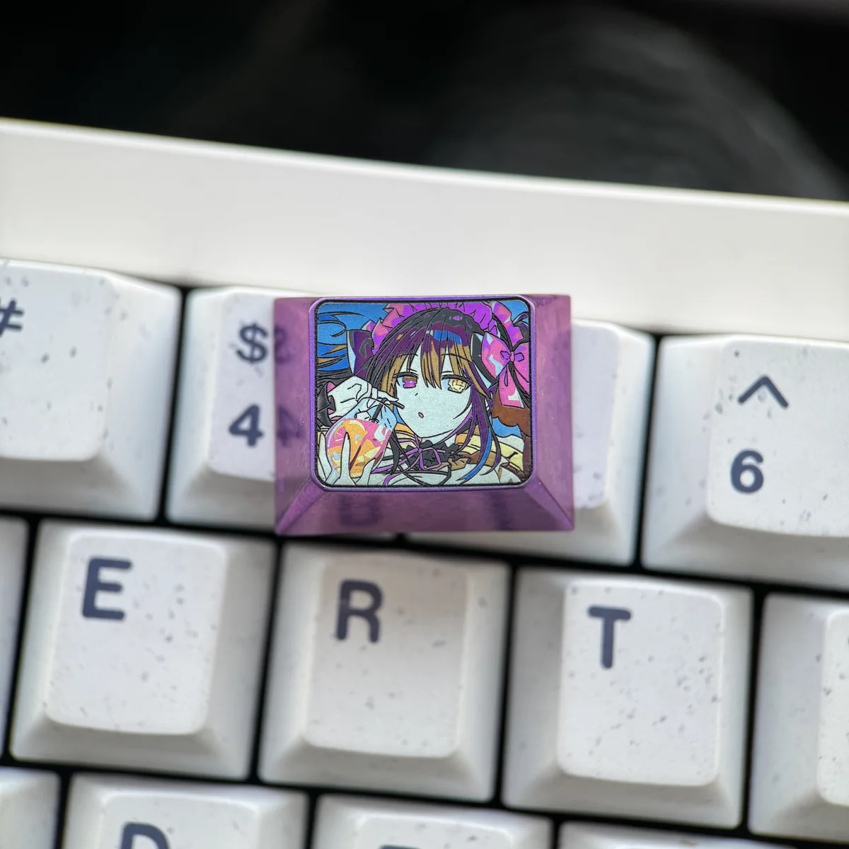 Multiple angles of the Kurumi Tokisaki titanium keycap, showcasing vibrant anime art and the premium metallic finish. A durable Date A Live collections.