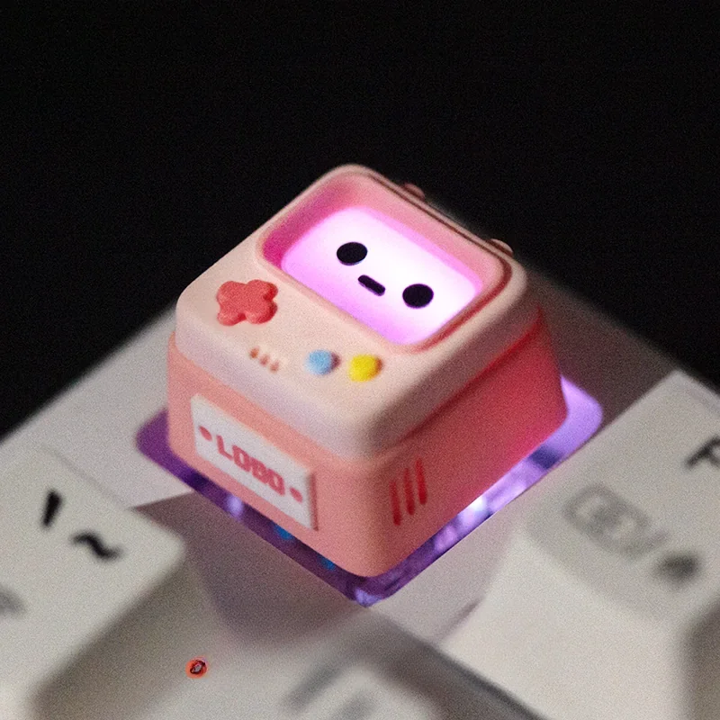 LOBO Vintage Console Artisan Gaming ESC Keycap, handcrafted from vibrant translucent resin, showcasing luminous miniature retro gaming console details.