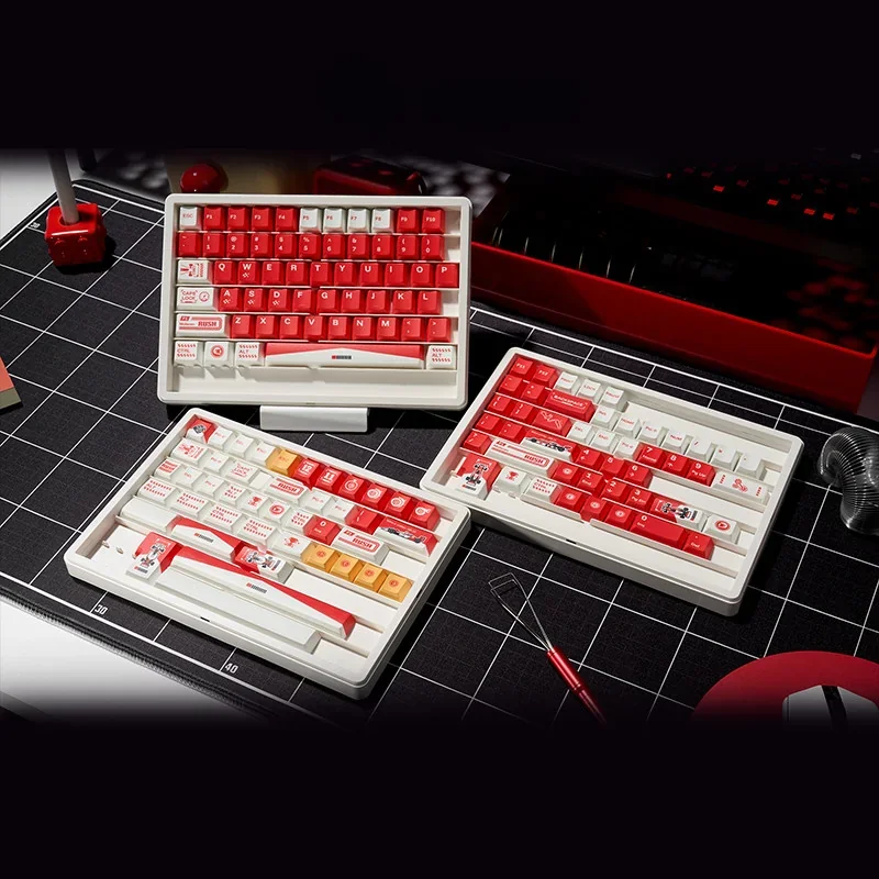 Marlboro F1 Racing PBT gaming keycap set. Bold red and white, iconic motorsport design shown from multiple angles. Durable PBT for enhanced gaming.