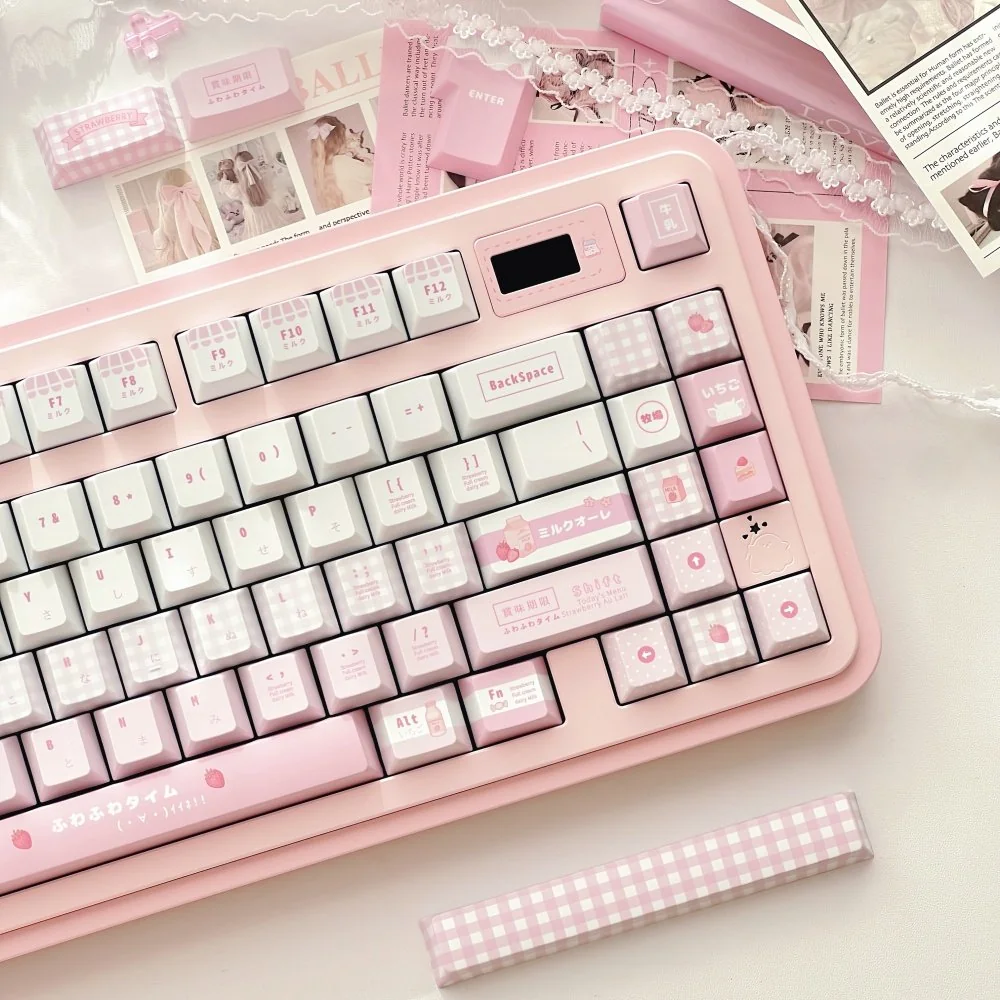 Sweet Meiji Strawberry PBT keycaps set, photographed from various angles, highlighting their charming pink and white snack-inspired design.