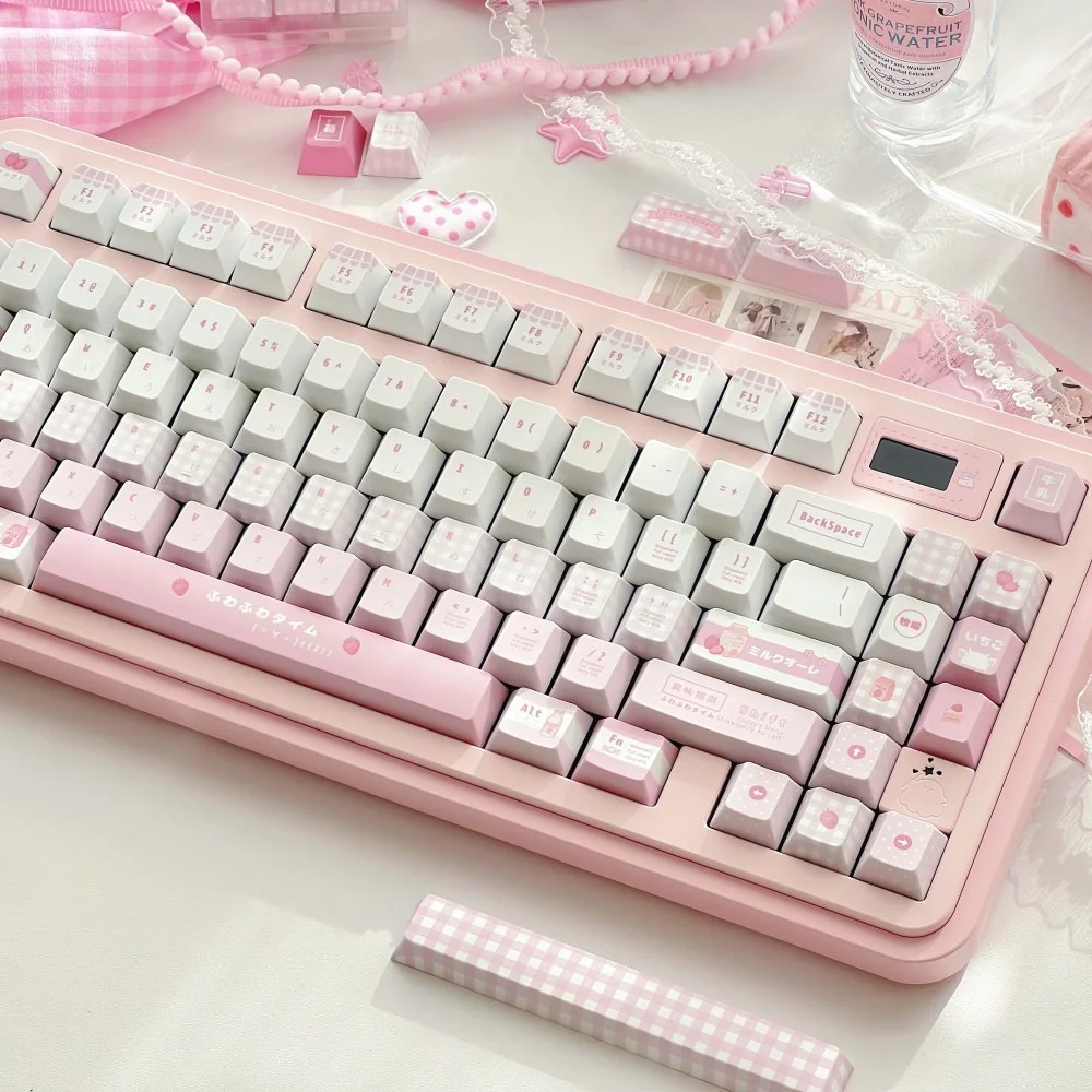 Sweet pink Meiji Strawberry PBT keycaps set displayed from multiple angles, showcasing the charming snack-inspired design.