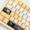 Exquisite Overwatch Mercy artisan keycap set, showcasing its angelic white and gold design from multiple elegant angles. A true masterpiece.