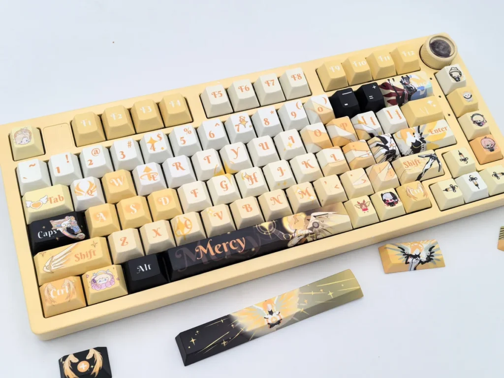 Exquisite Mercy Keycap Set, an angelic Overwatch artisan masterpiece in white and gold, capturing her elegant, futuristic design.